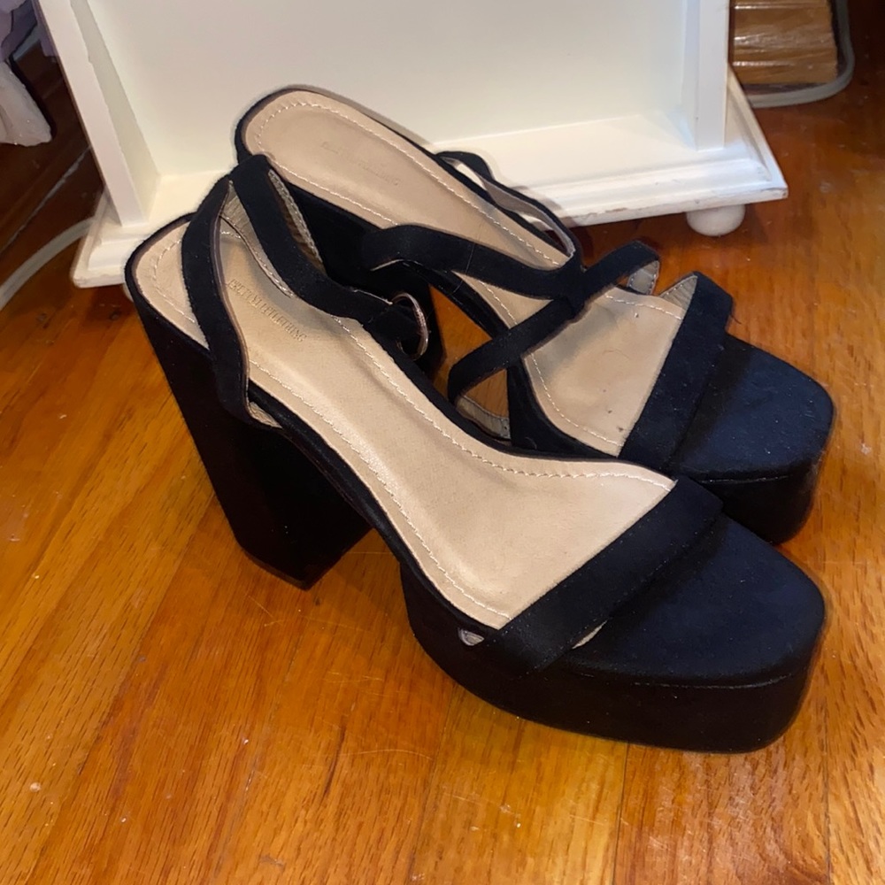 All black chunky heels. Very comfortable just not my size. Never worn before!